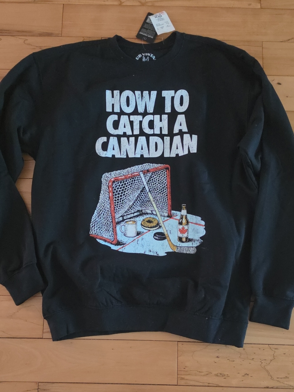 Men's Black Graphic Crewneck Sweatshirt - 'How to Catch a Canadian'